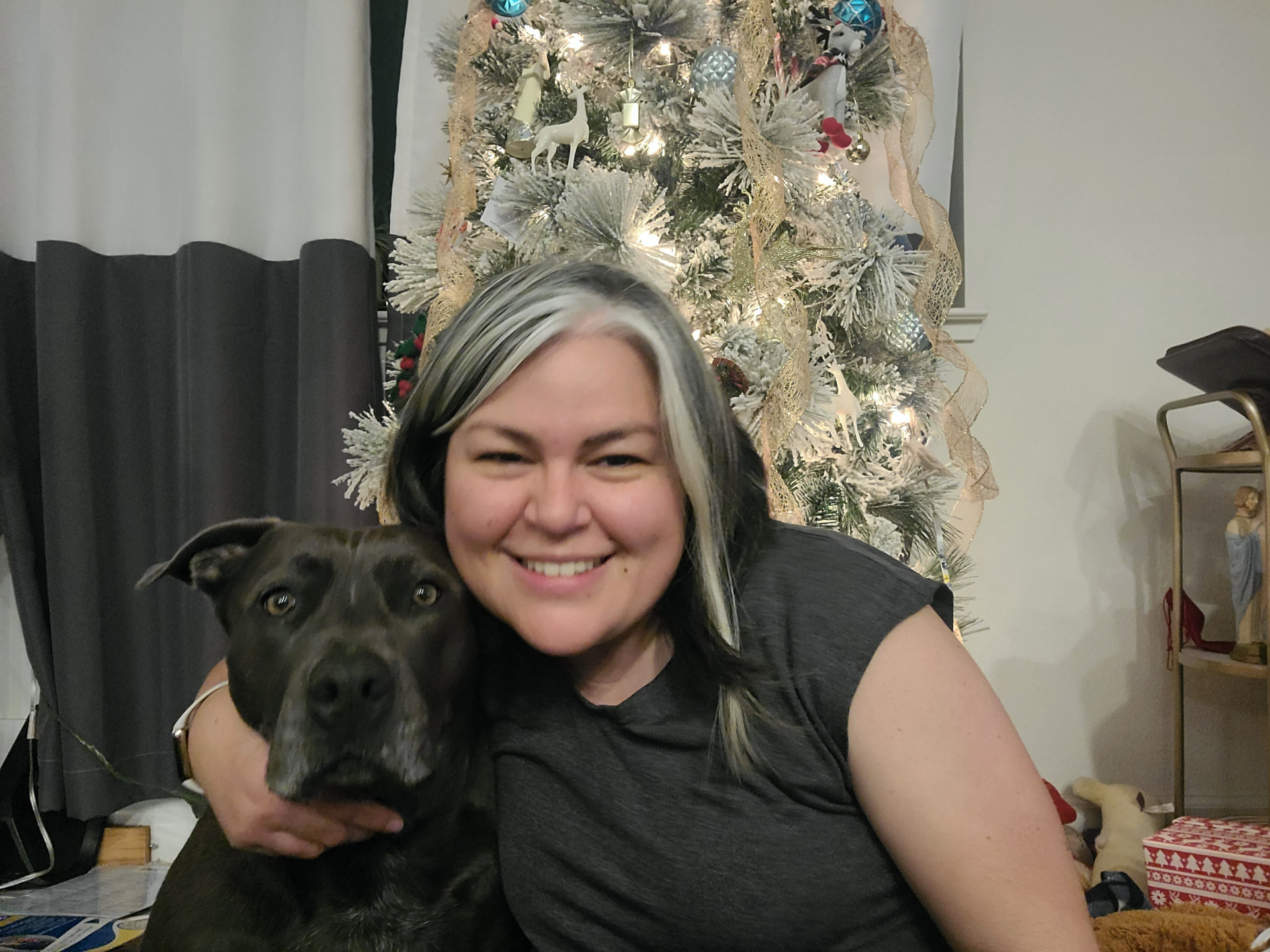 Betty Davis, a UX designer, with her dog